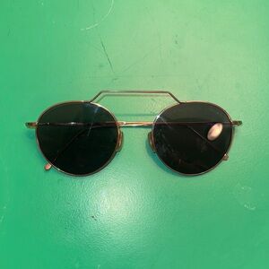 Illesteva Stylish Black and Gold Sunglasses